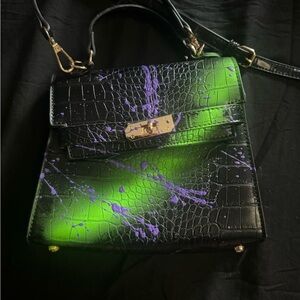 Rockstar original crossbody bag. Super unique. Love these colors.